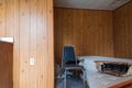 Wrecked mattresses in an abandoned motel room