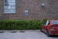 Wrecked red car in the parking lot Royalty Free Stock Photo