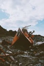 Wrecked ship on rocky seaside old rusty boat shipwreck in Norway