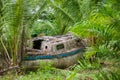 Wrecked and weathered hull of an abandoned sailboat