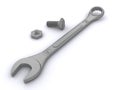 Wrench, bolt and nut against white