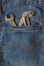 Wrench in jean Royalty Free Stock Photo