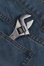 Wrench in jean pocket Royalty Free Stock Photo