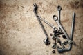 Wrench with nuts and bolt. Space for text. Royalty Free Stock Photo