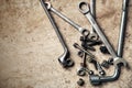 Wrench with nuts and bolt. Space for text. Royalty Free Stock Photo