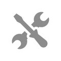 Wrench and screwdriver crossed filled vector icon