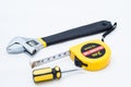 Wrench screwdriver and measuring tape Royalty Free Stock Photo