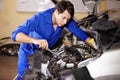 Wrench, serious man and mechanic check engine of car, repair or maintenance. Spanner tools, technician and person on
