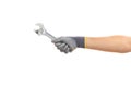 Hand holding a metal wrench on white background Royalty Free Stock Photo