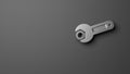 Wrench tightening nut on gray background, thirty frame