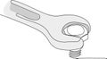 wrench tightens bolt in steel billet spanner bolt