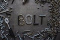 Word Bolt made of old nuts and bolts. Industrial style Royalty Free Stock Photo