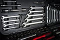 Wrench tools and nuts on black box Royalty Free Stock Photo