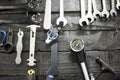 Wrenches and other hardware hanging on a tool board in a bicycle repair shop