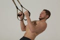 Arms muscles training on TRX bodybuilder Royalty Free Stock Photo