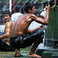 A wrestler cools off after his bout at the Kirkpinar Turkish Oil Wrestling Festival in Edirne in Turkey.