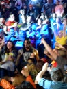 Wrestler Roman Reigns walks through crowd to the ring