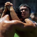 Wrestlers locked in battle at the Elmali Turkish Oil Wrestling Festival in Turkey.