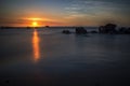 Wrick and Beautiful sunrise at Tg Aru beach, Labuan. Malaysia Royalty Free Stock Photo