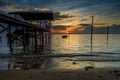 Wrick and Beautiful sunrise at Tg Aru beach, Labuan. Malaysia Royalty Free Stock Photo