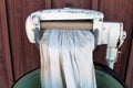 Wringer Washing Machine with White Linen Cloth Royalty Free Stock Photo