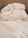 wrinkle messy blanket and bed sheets in bedroom after waking up in the morning, from comfort sleeping in long night.