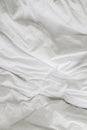Wrinkle messy blanket and white pillow in bedroom after waking up in the morning, from sleeping in a long night Royalty Free Stock Photo