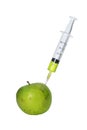 Wrinkled apples with syringe needle isolated on white background