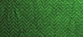 Wrinkled rich green silver fabric. Texture background for design