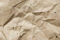 Wrinkled brown kraft paper textured background Royalty Free Stock Photo