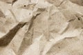 Wrinkled brown kraft paper textured background Royalty Free Stock Photo