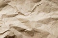 Wrinkled brown kraft paper textured background Royalty Free Stock Photo