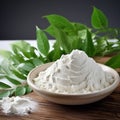 Wrinkled Carrageenan plant with pure natural white powder on bowl