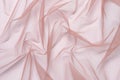 wrinkled, compressed fabric mesh tulle pink on white isolated background close-up. background for your design Royalty Free Stock Photo