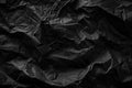 Wrinkled crushed texture of crumpled black paper. Abstract backgrounds Royalty Free Stock Photo