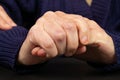 Wrinkled elderly hands