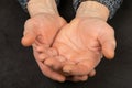 Wrinkled elderly hands