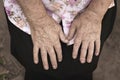 Wrinkled hands of an elderly woman coseup, concept of age, generation of senior citizens, labor Royalty Free Stock Photo