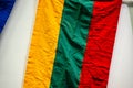 Wrinkled lithuanian ship flag on a wall.. Royalty Free Stock Photo