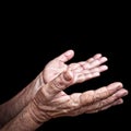 Wrinkled old hands begging Royalty Free Stock Photo