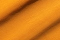 Wrinkled orange crepe paper background texture Royalty Free Stock Photo