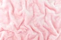 Wrinkled pink cloth texture abstract background