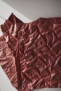 Wrinkled red recycling paper using as background. Royalty Free Stock Photo