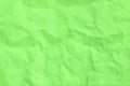 Wrinkled sheet of green paper