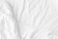 Wrinkled white bedsheet backdrop