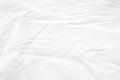 Wrinkled white cotton canvas fabric textured background, wallpaper