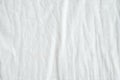 Wrinkled white cotton fabric texture background, wallpaper Royalty Free Stock Photo