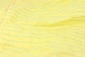 Wrinkled Yellow Legal Paper Background