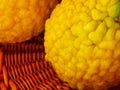 Wrinkled yellow lemon skin in a basket, Spain