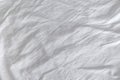 Wrinkles on crumpled white cotton sheets textire Royalty Free Stock Photo